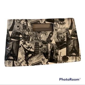 Brand New Unused Black and White Clutch without tags. No flaws or defects.